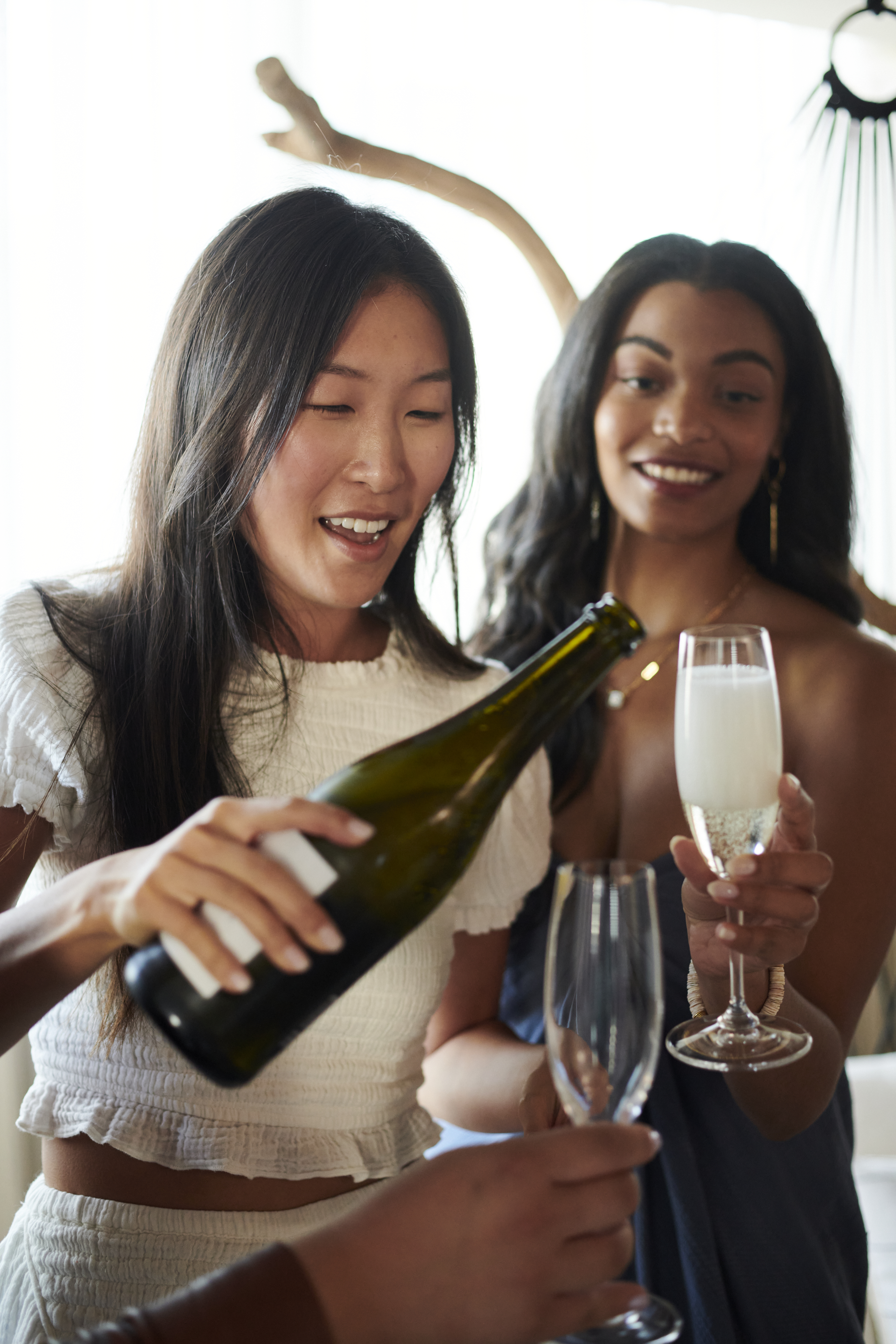 Women pouring champagne 
