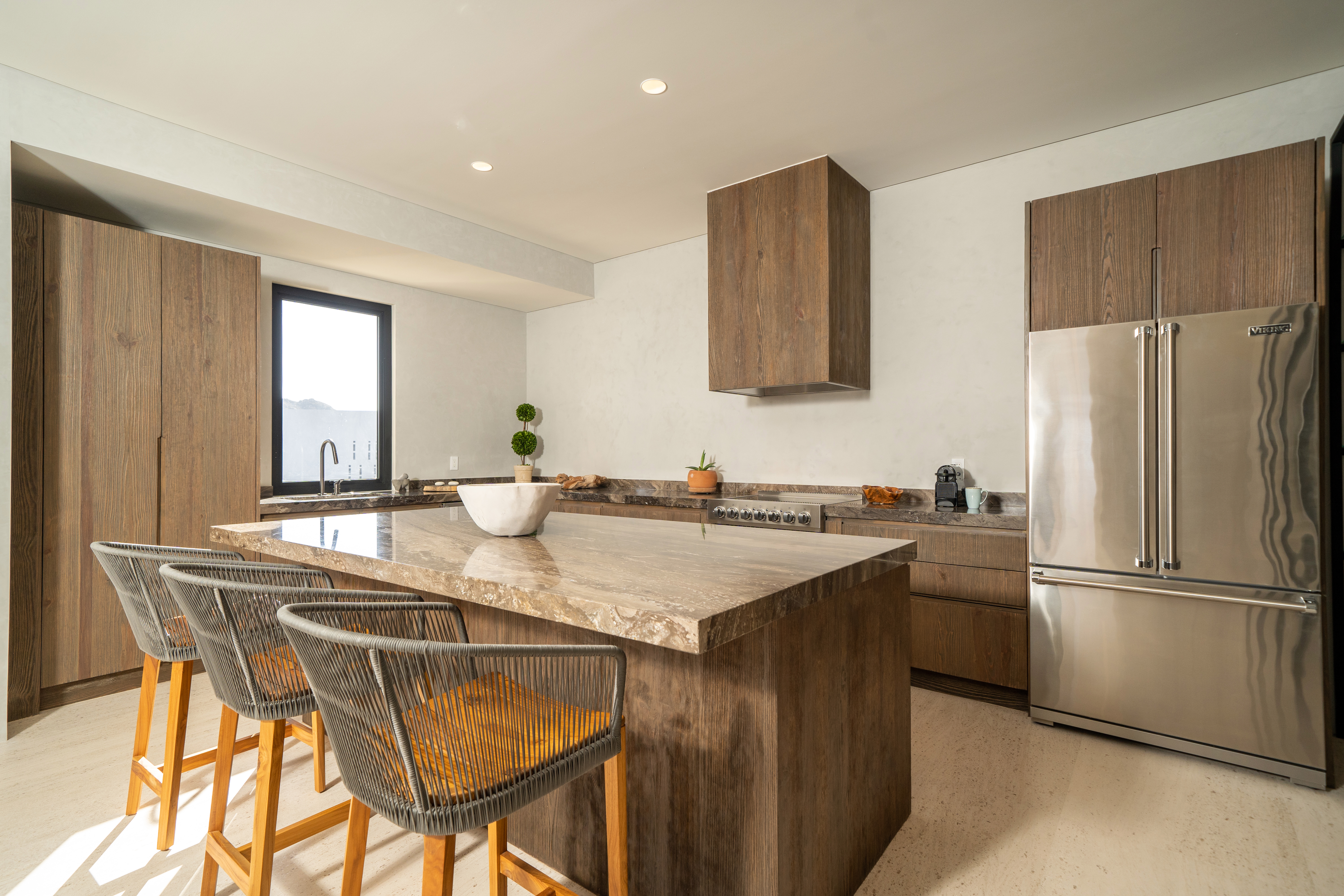 Brown themed kitchen with island