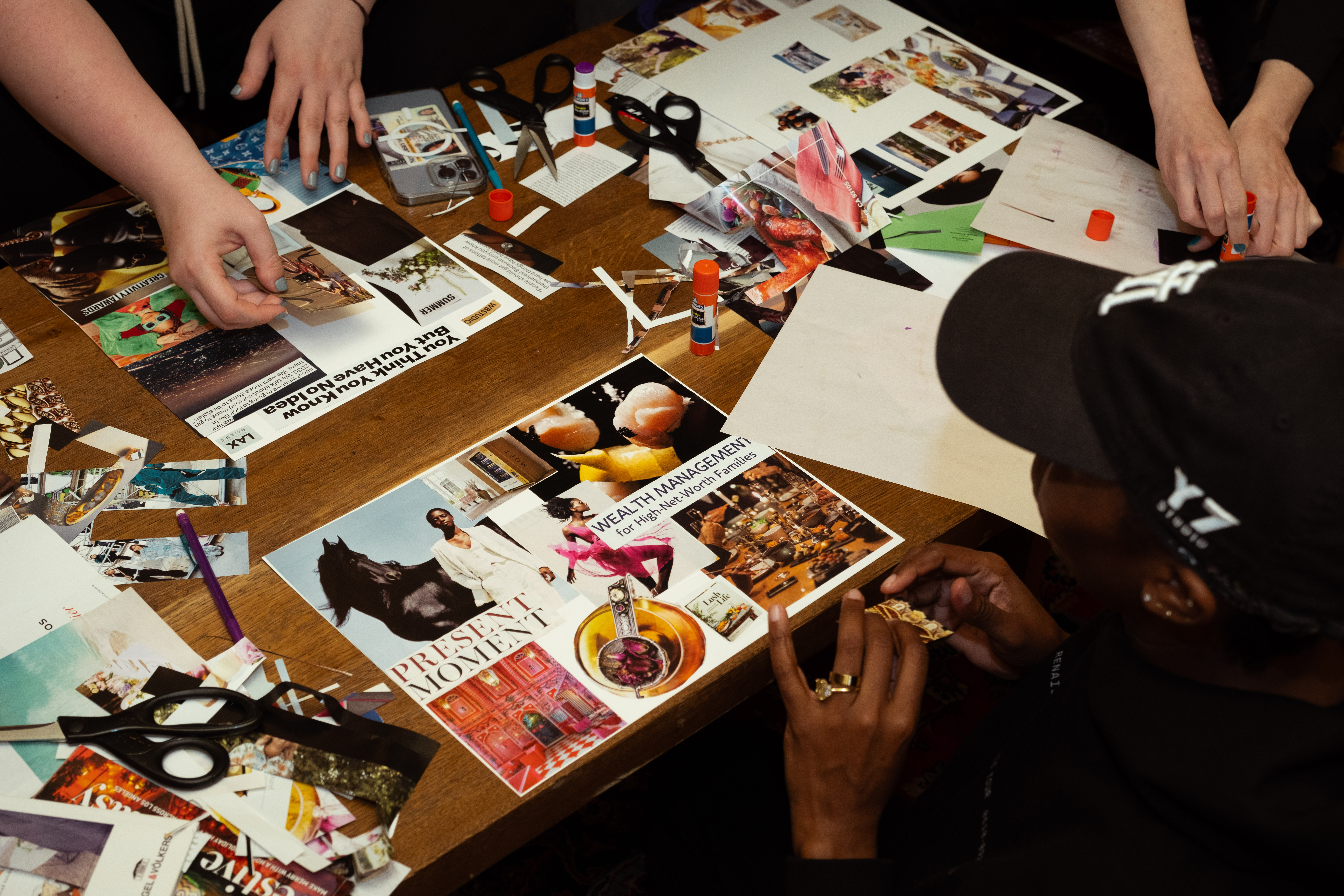 people putting picture collages together