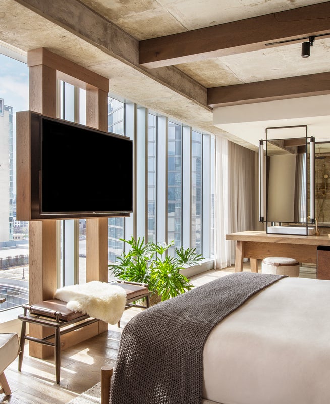 hotel room with floor to ceiling windows