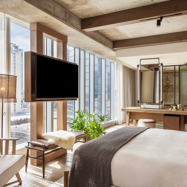 hotel room with floor to ceiling windows