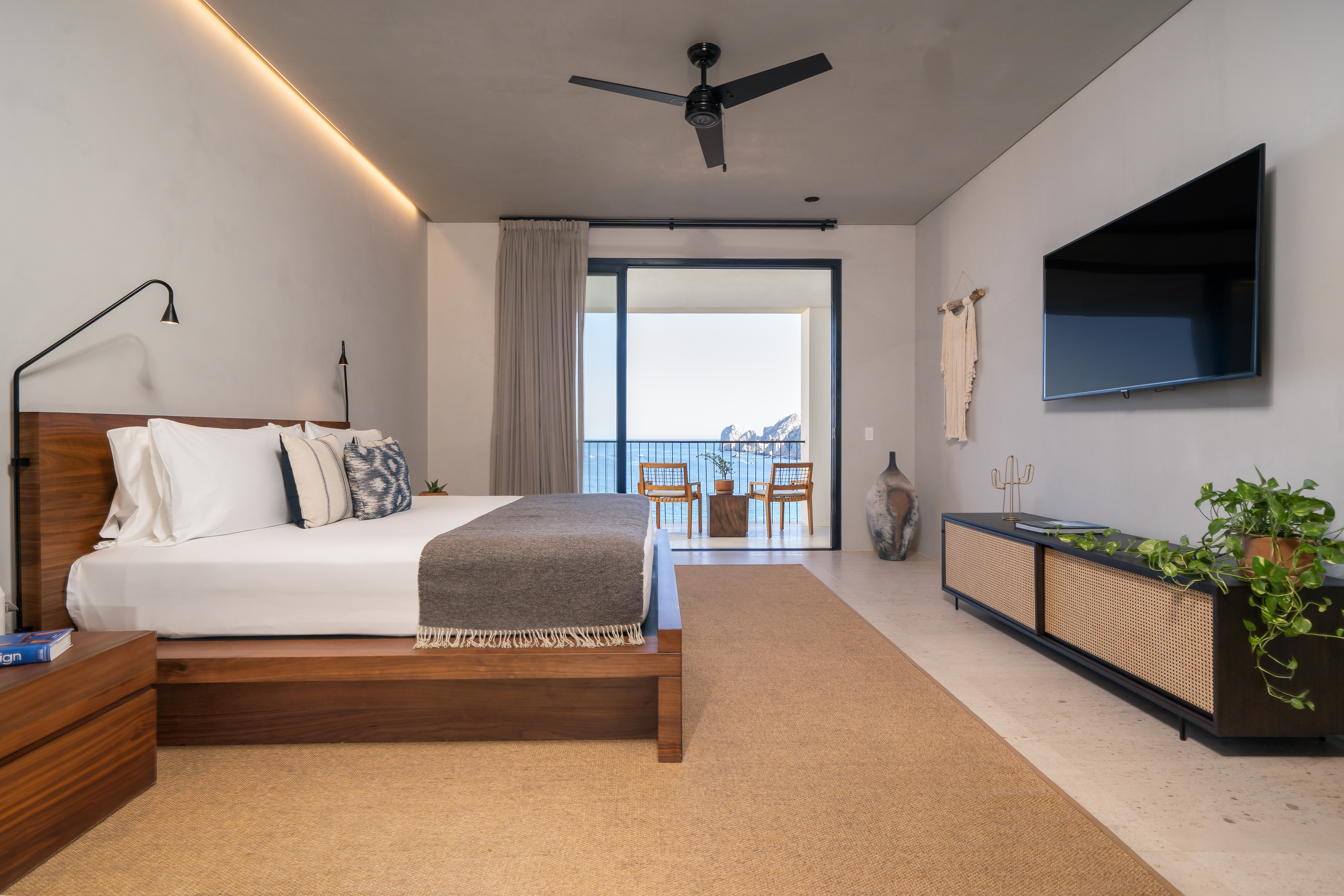 Made bed on a raised wooden frame