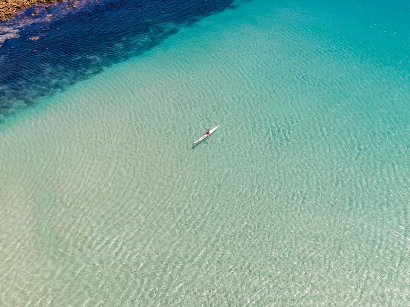 Birds eye view of a person kayaking