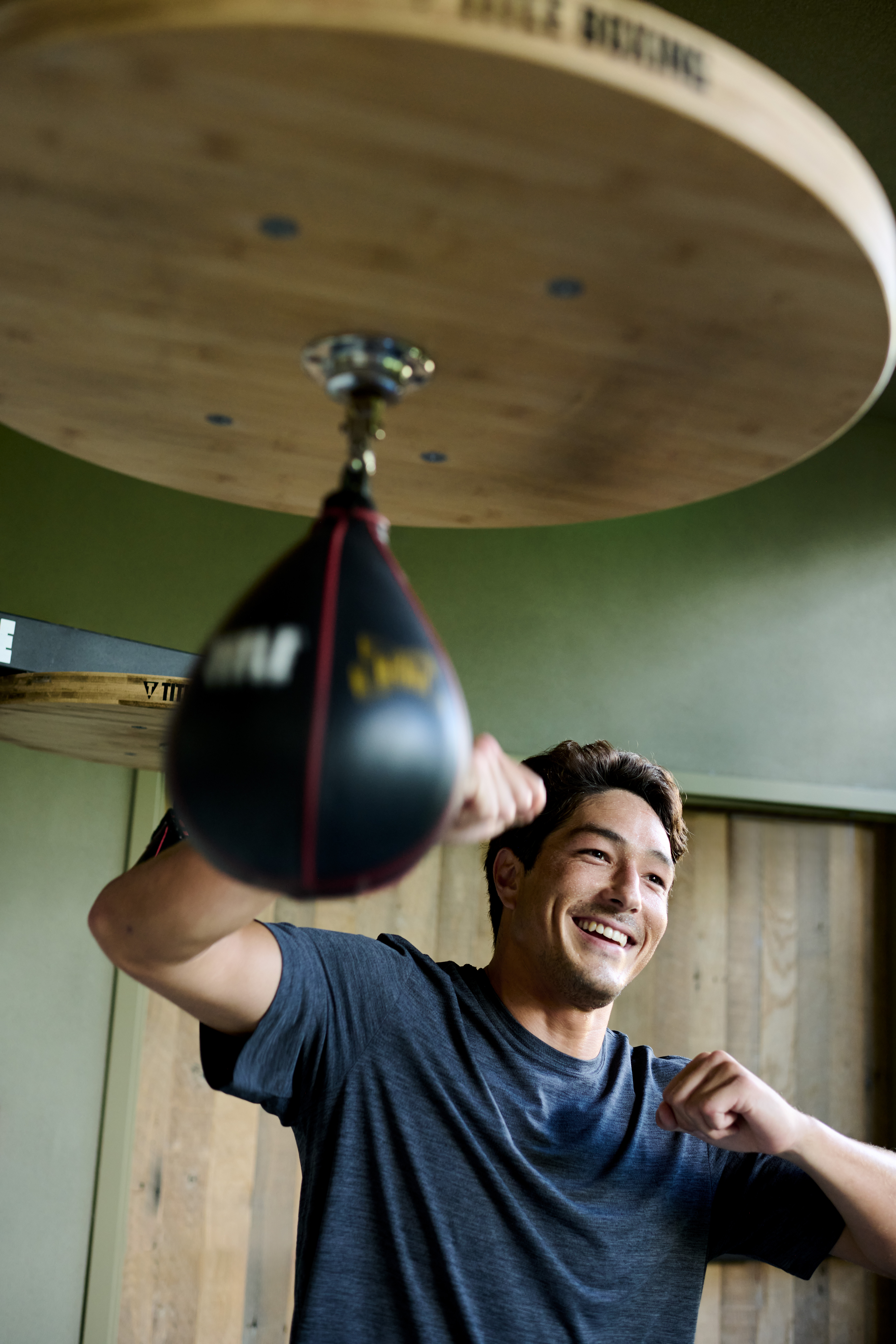 person using a speed bag