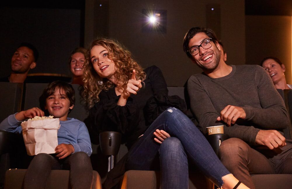 family in screening room