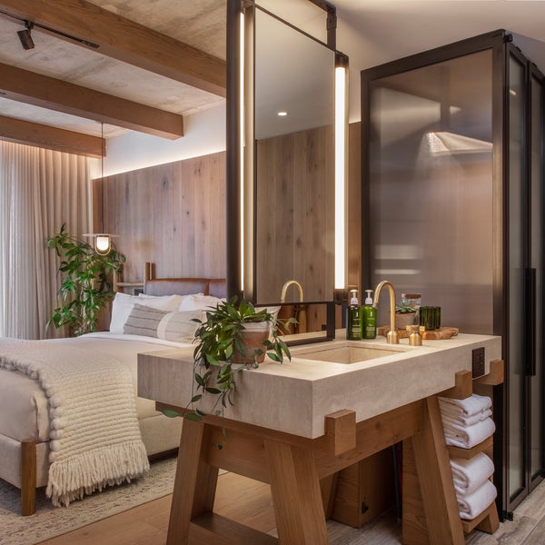 Bedroom with a bathroom vanity