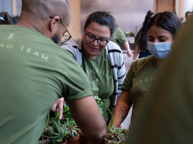 1 Hotel team distributing plants for the community