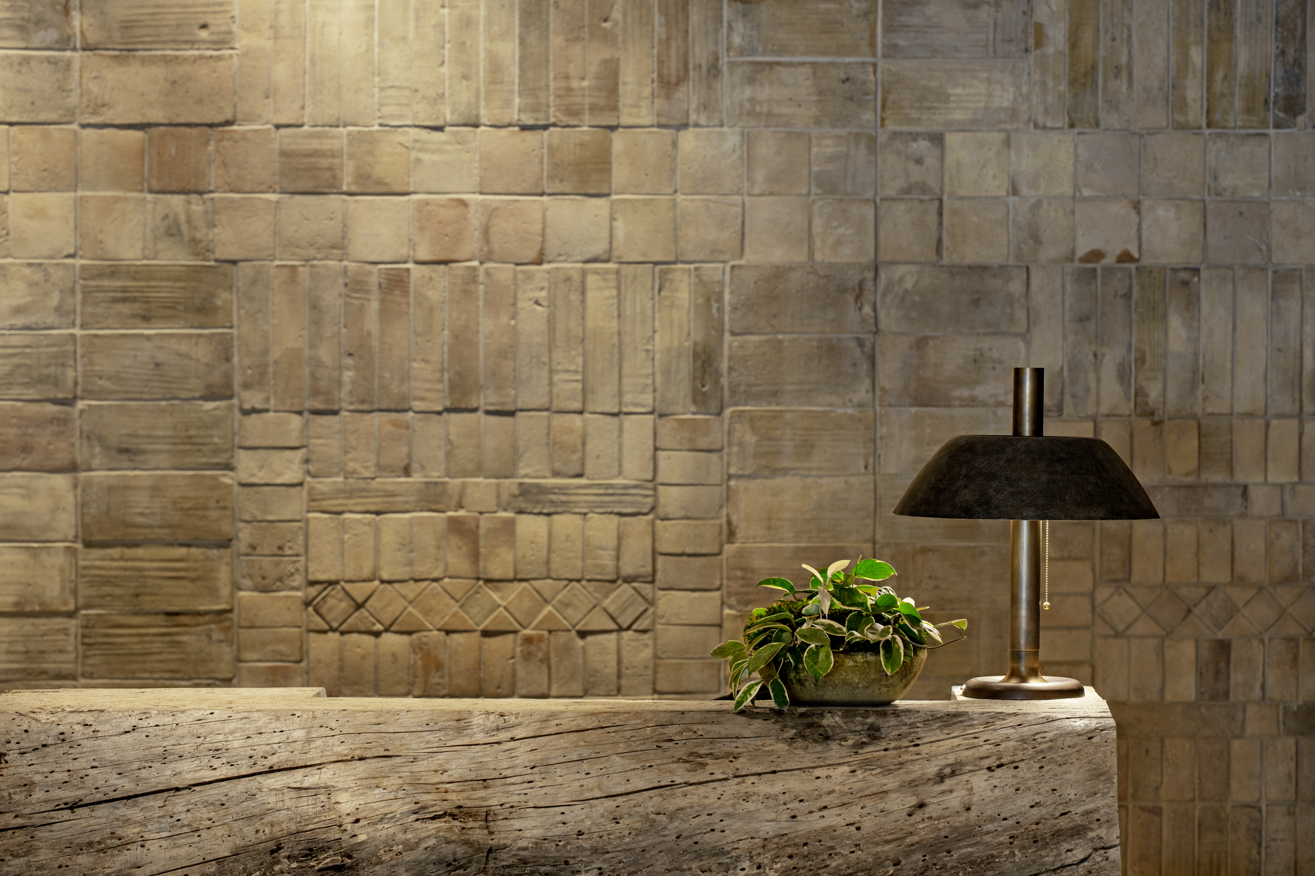 Reception desk with a beautiful stonewall backdrop