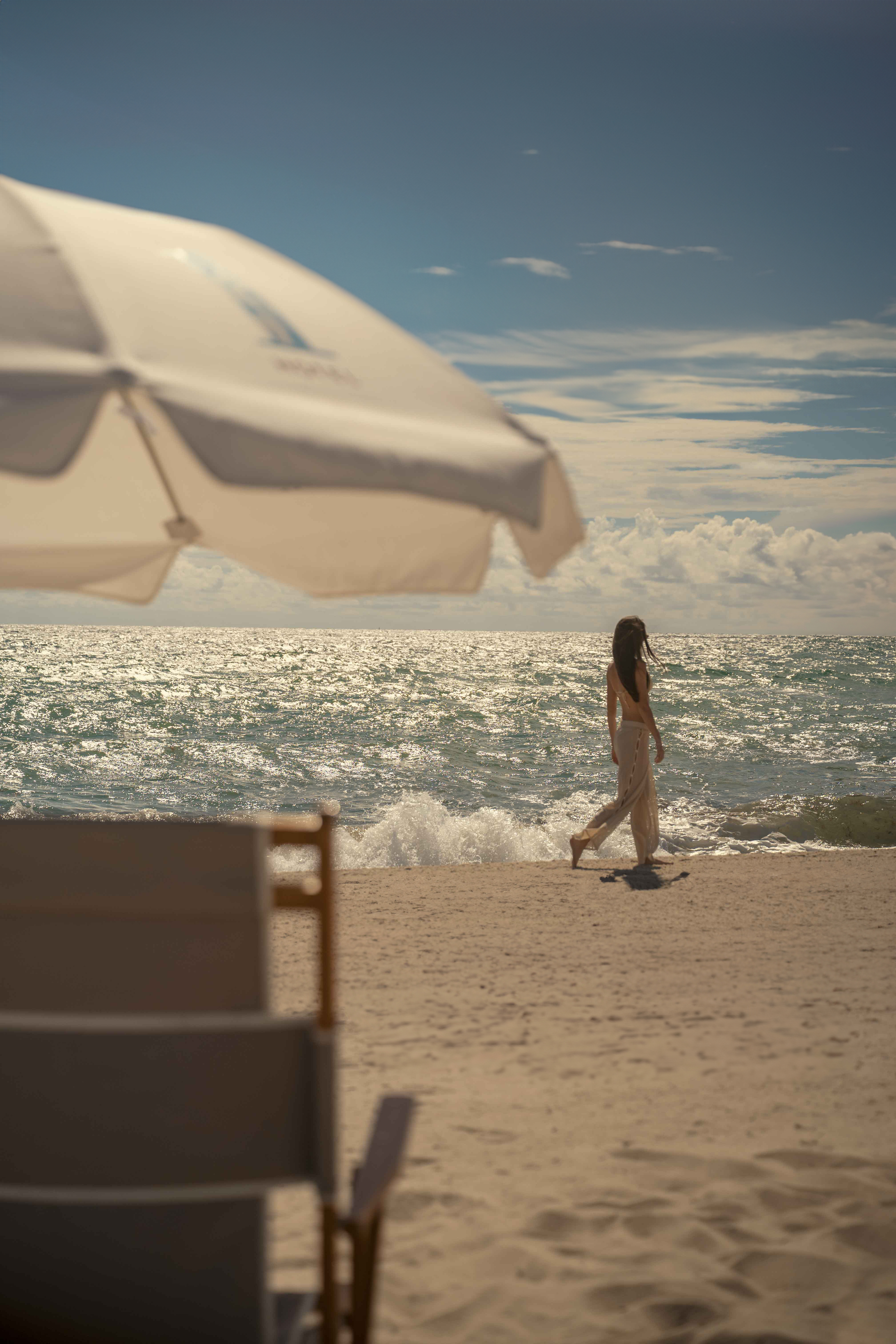 Girl walking on beach