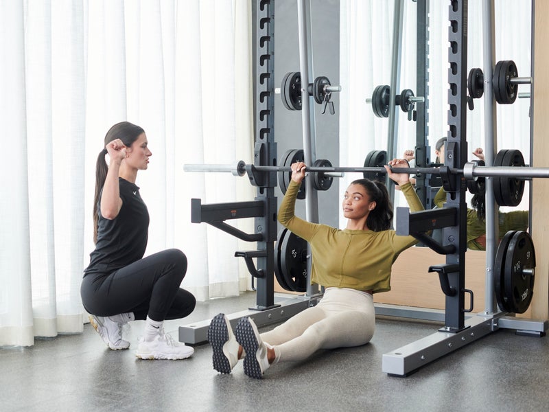 Woman with a personal trainer