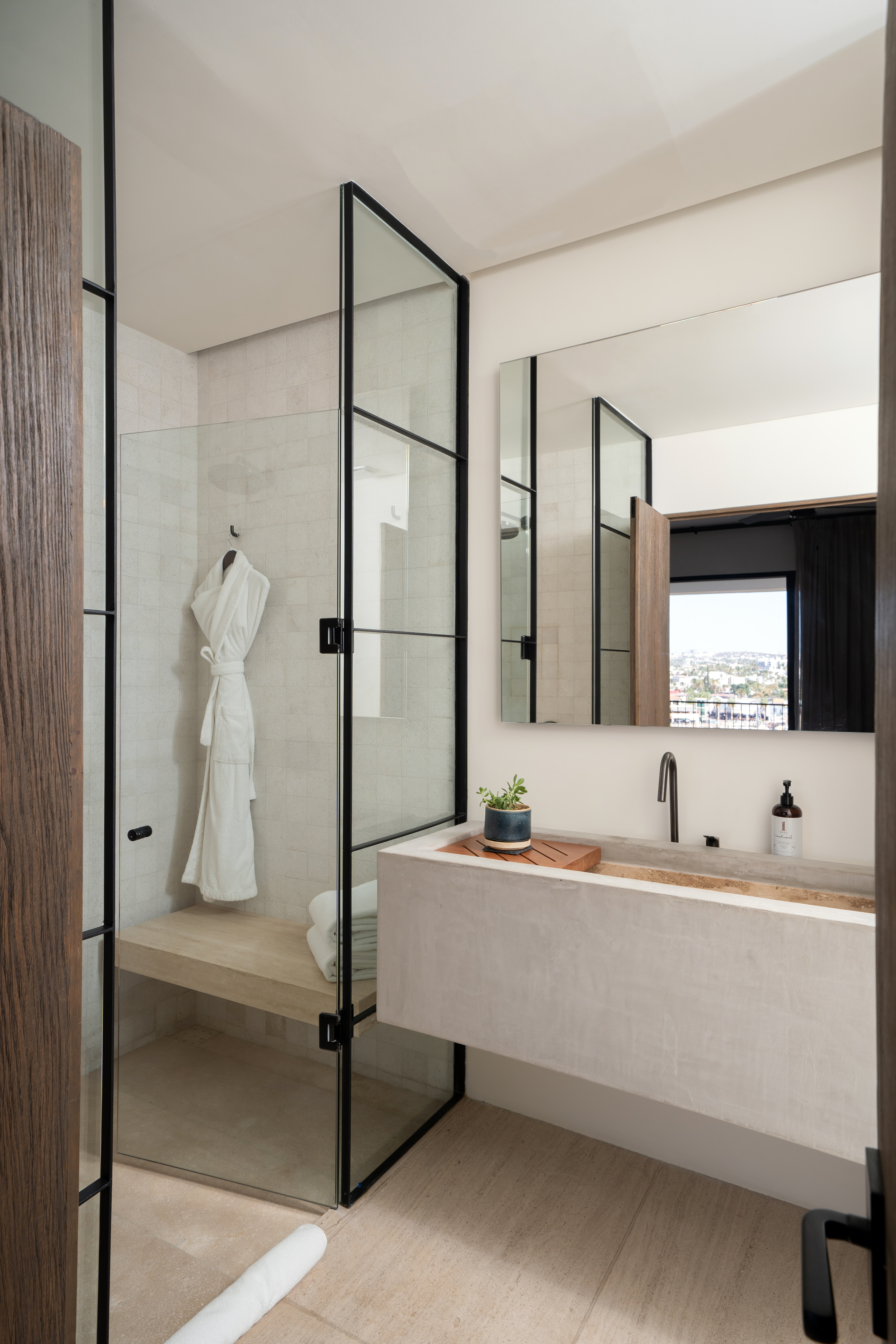 Ivory bathroom with a standing shower
