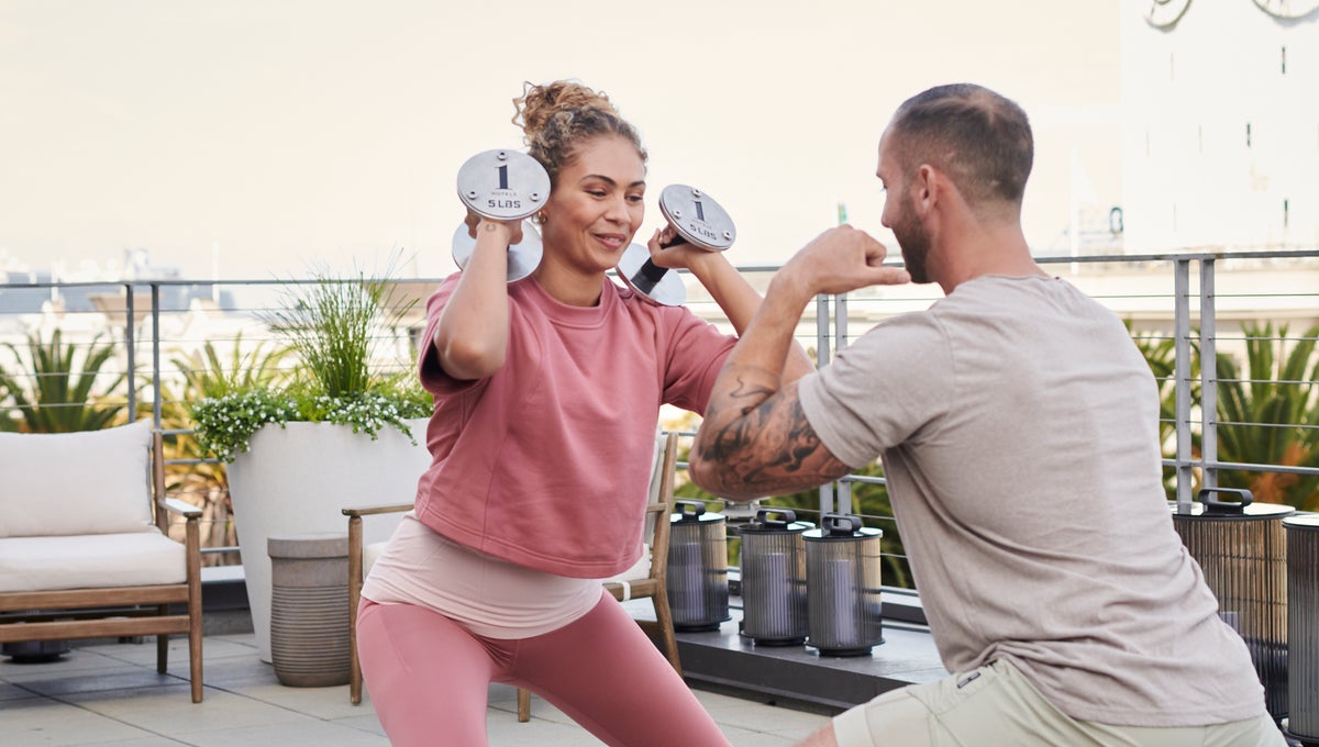 People working out at the 1 Hotel San Francisco rooftop