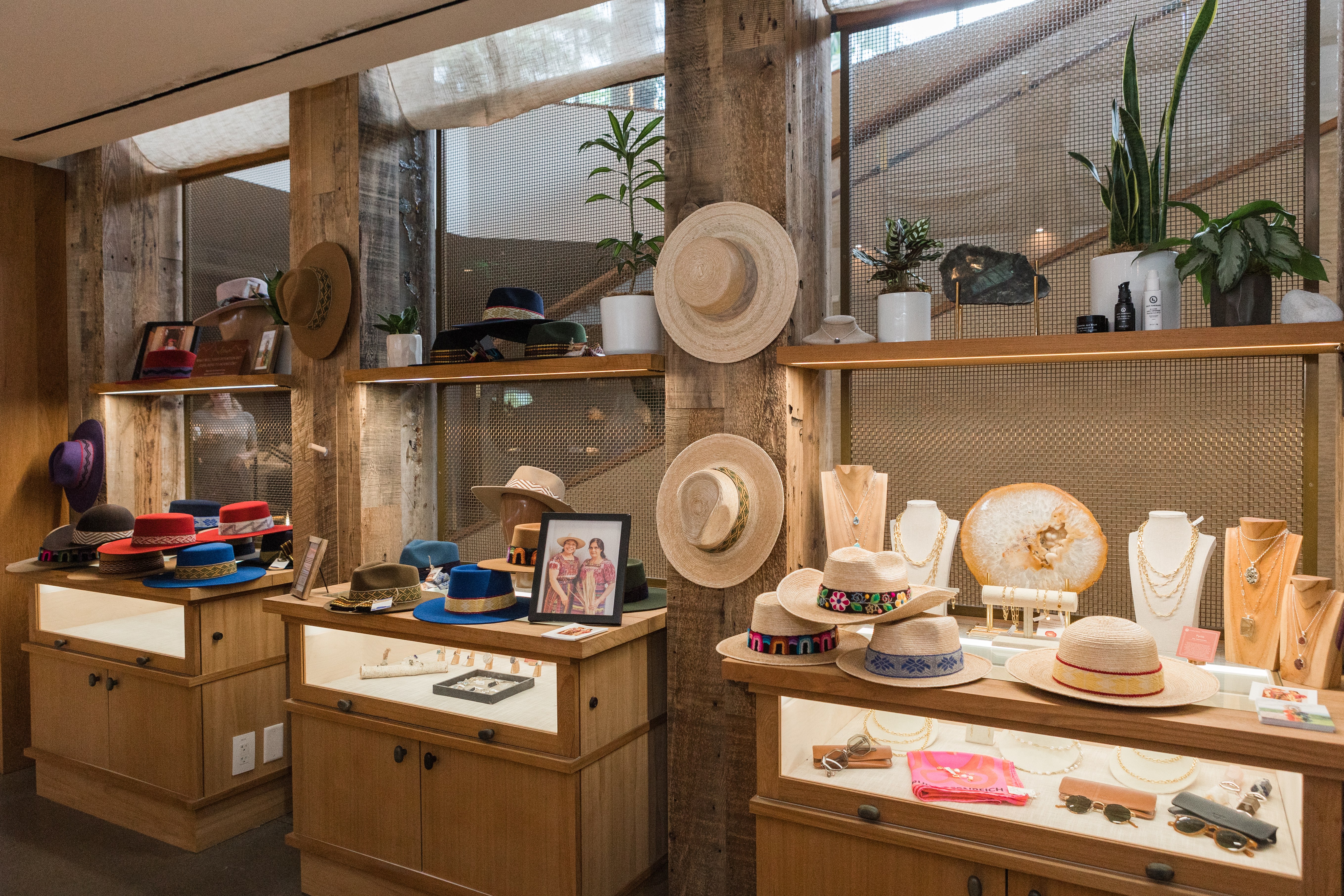 Displays in a store with hats and jewelry