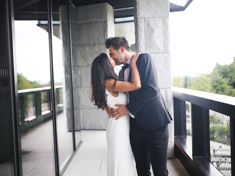 Bride and groom kissing