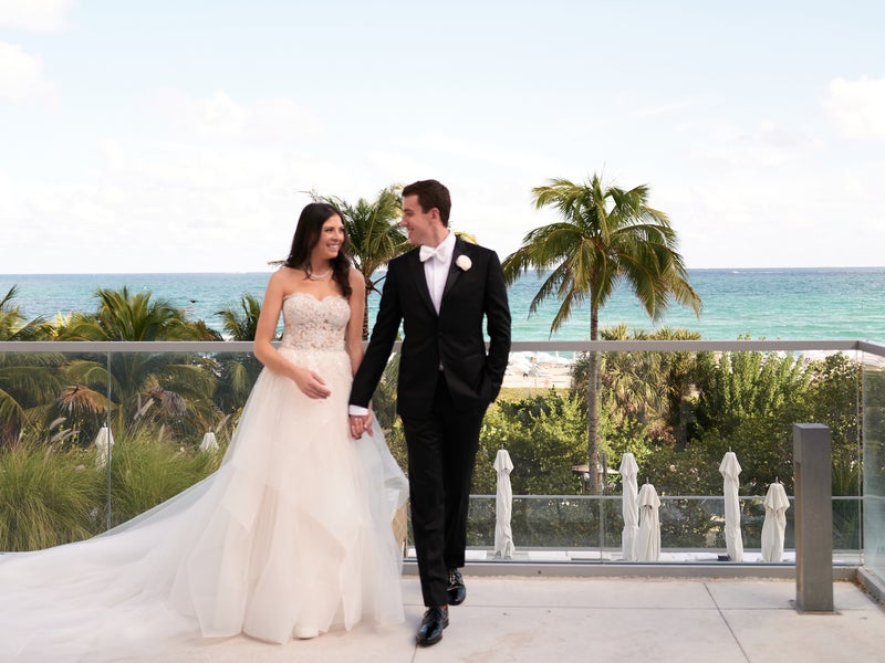 Bridge and Groom holding hands