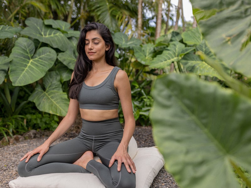 Woman meditating outside