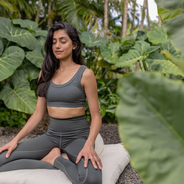 Woman meditating outside