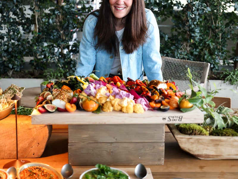 person standing with produce