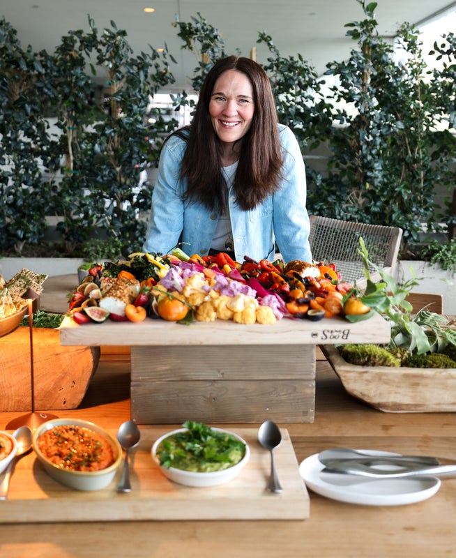 person standing with produce