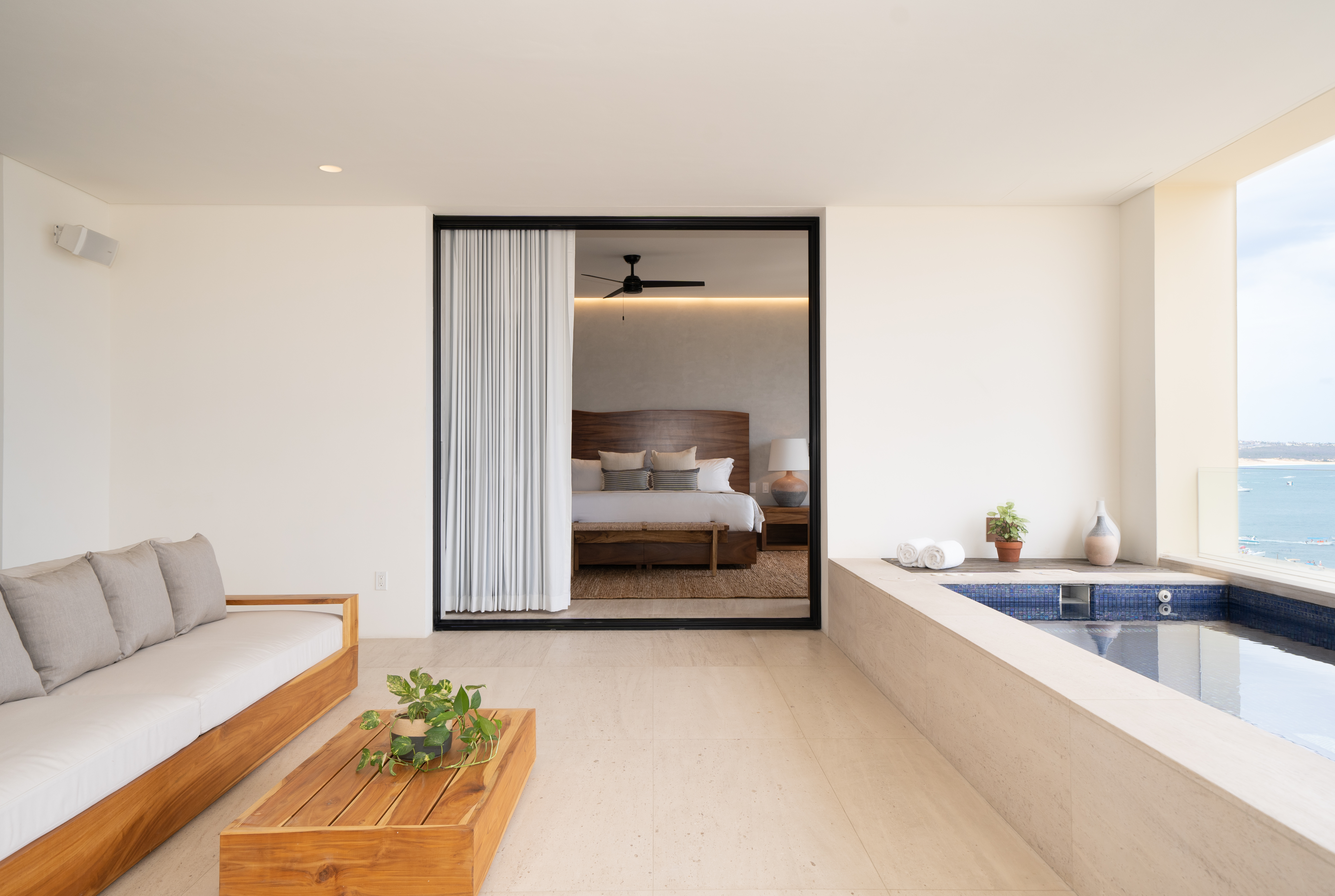 Large mirror next to a personal indoor pool
