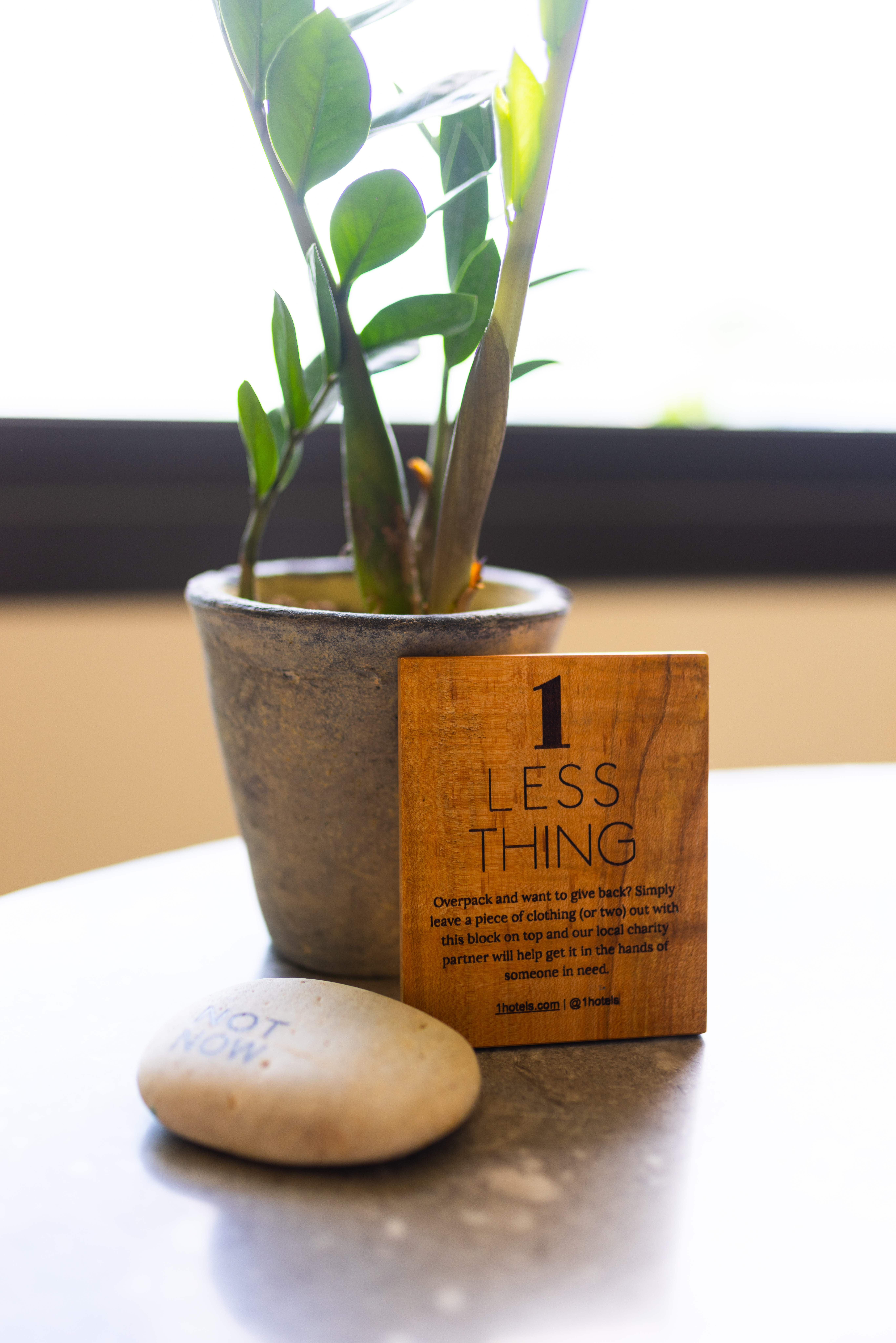 Hotel plaque one less thing