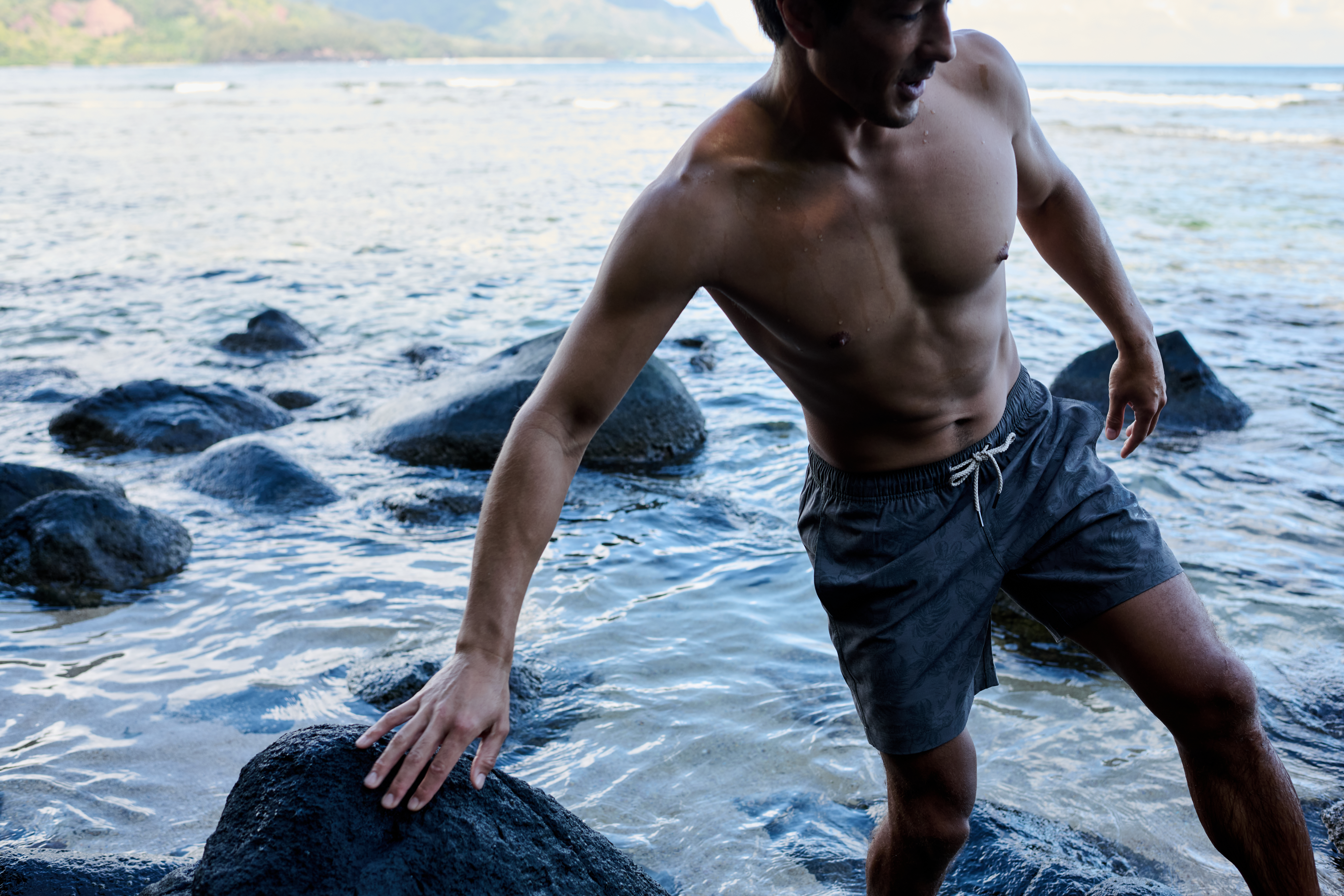 Man walking in ocean