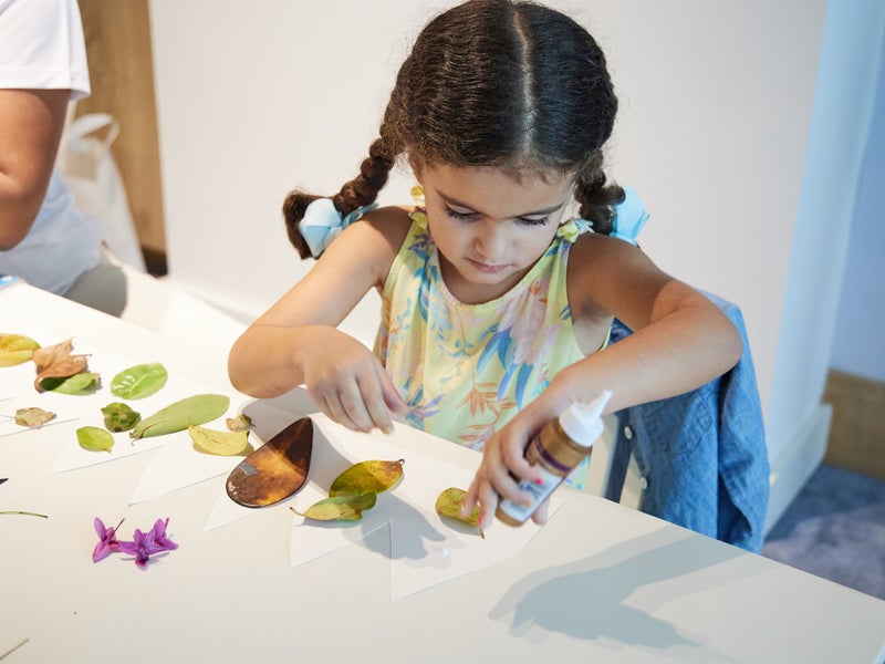 A child doing arts and crafts