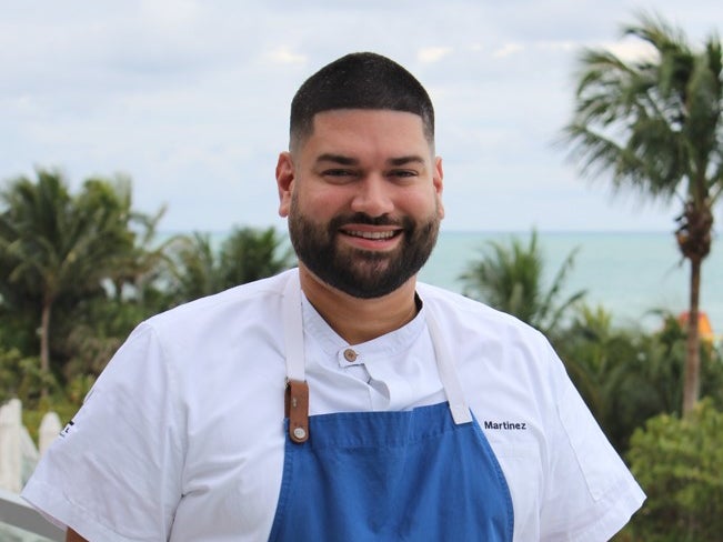 Chef Martinez posing for a photo
