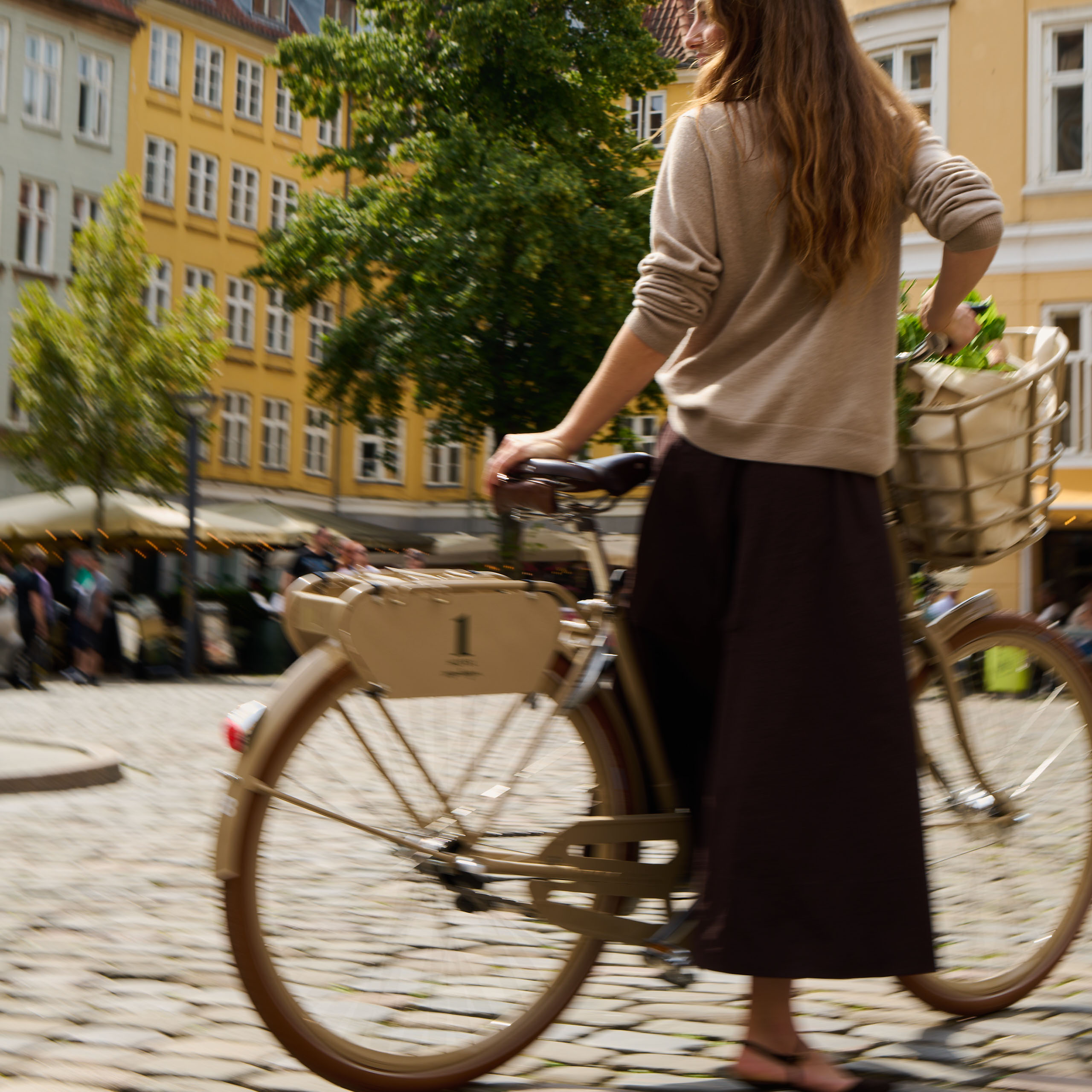 Woman with bike in Copenhagen