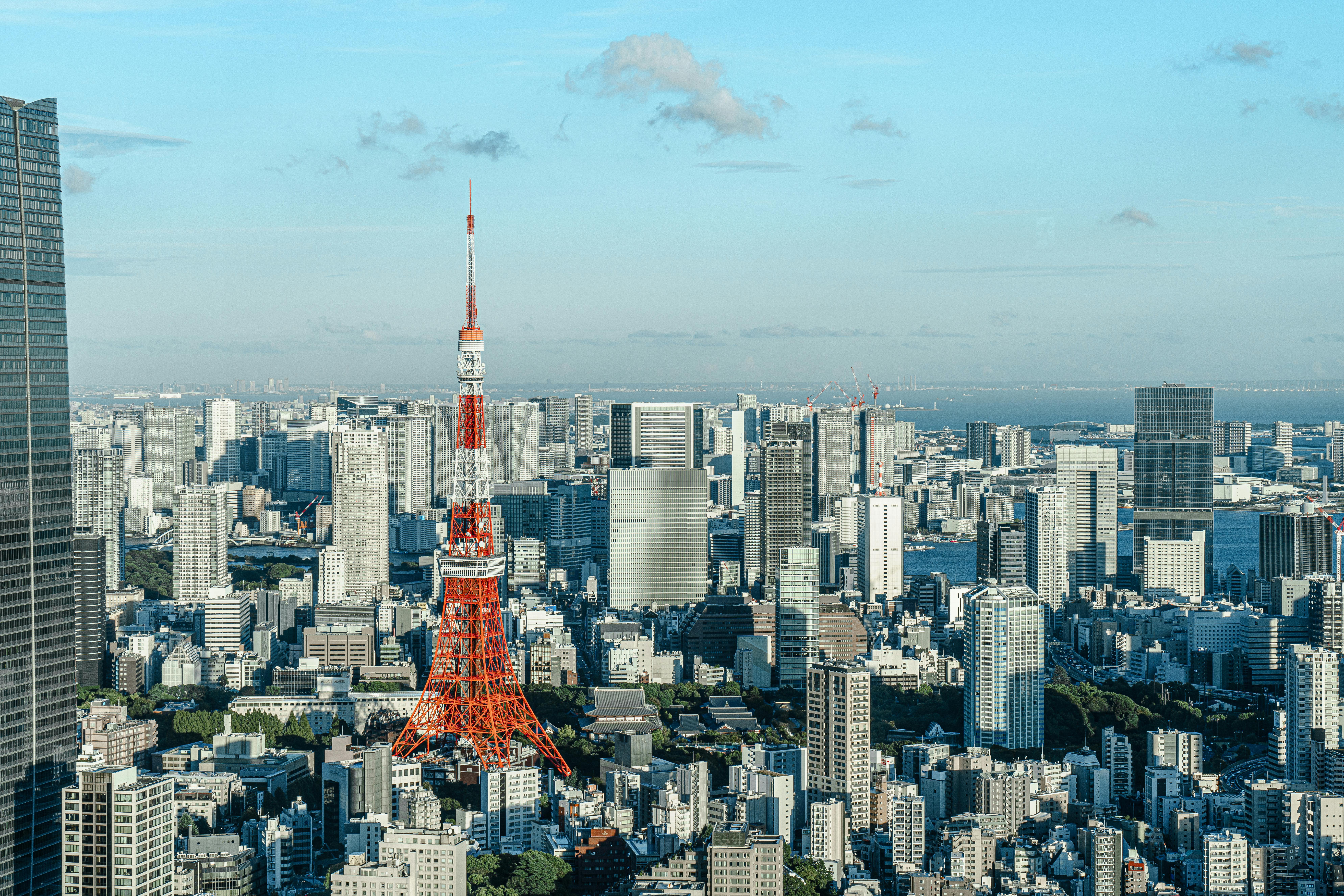 Tokyo Tower surrounded many tall buildings