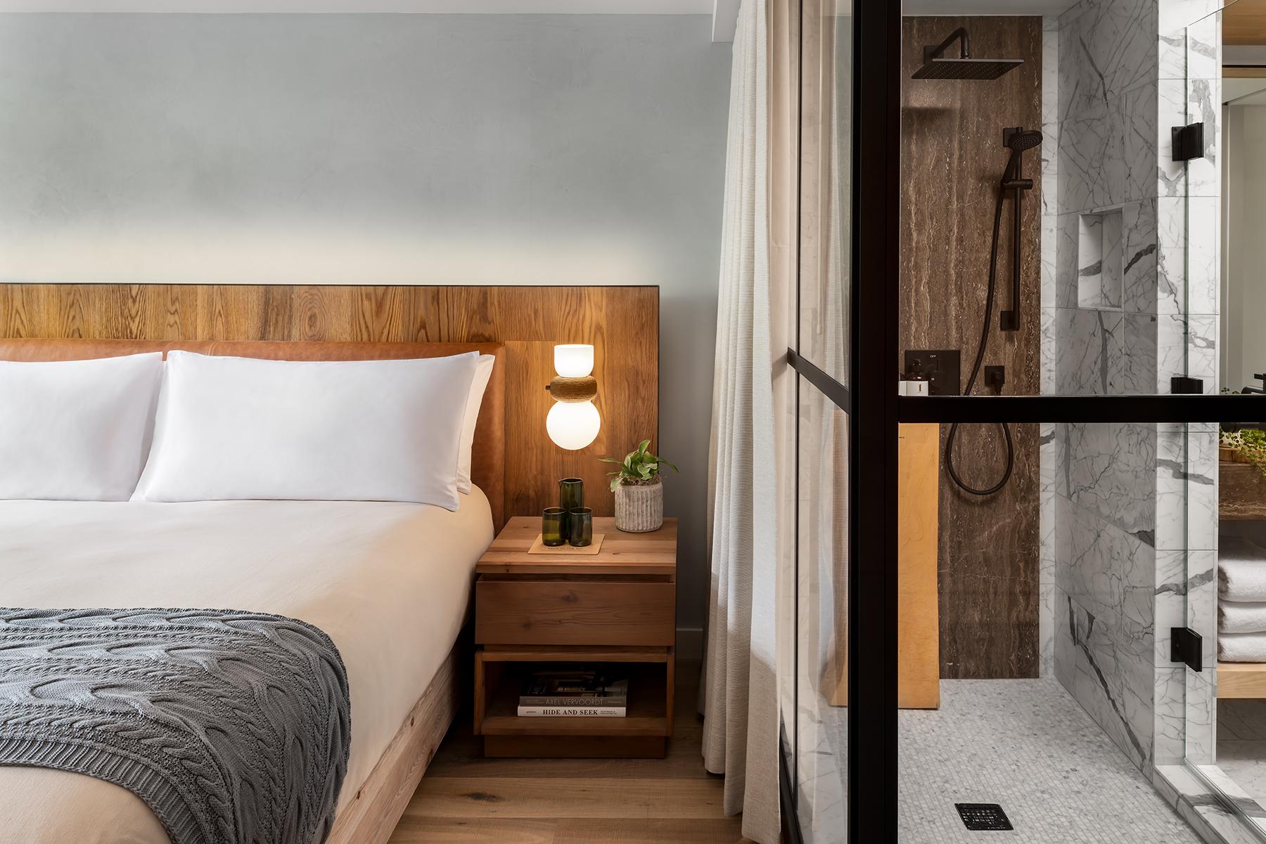 Bed next to a shower