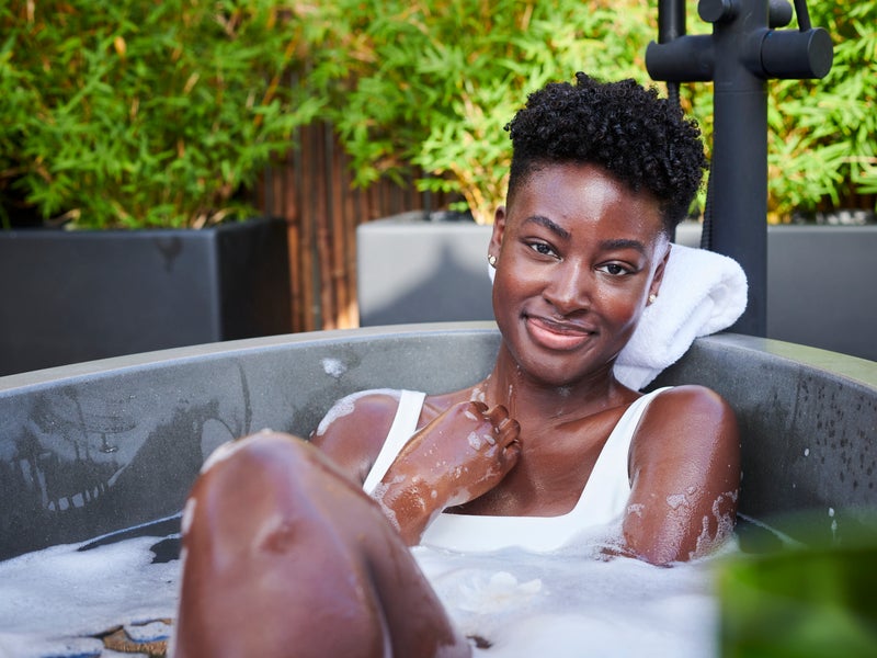 Person in an outdoor bath