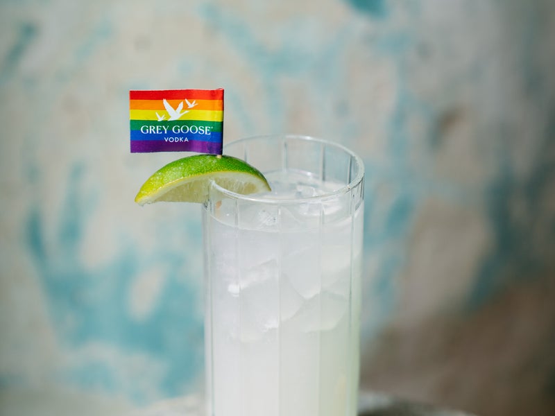 a drink with a rainbow flag