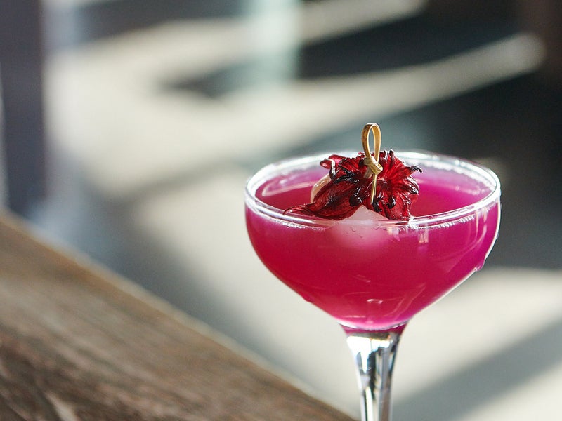 A pinkish purple cocktail