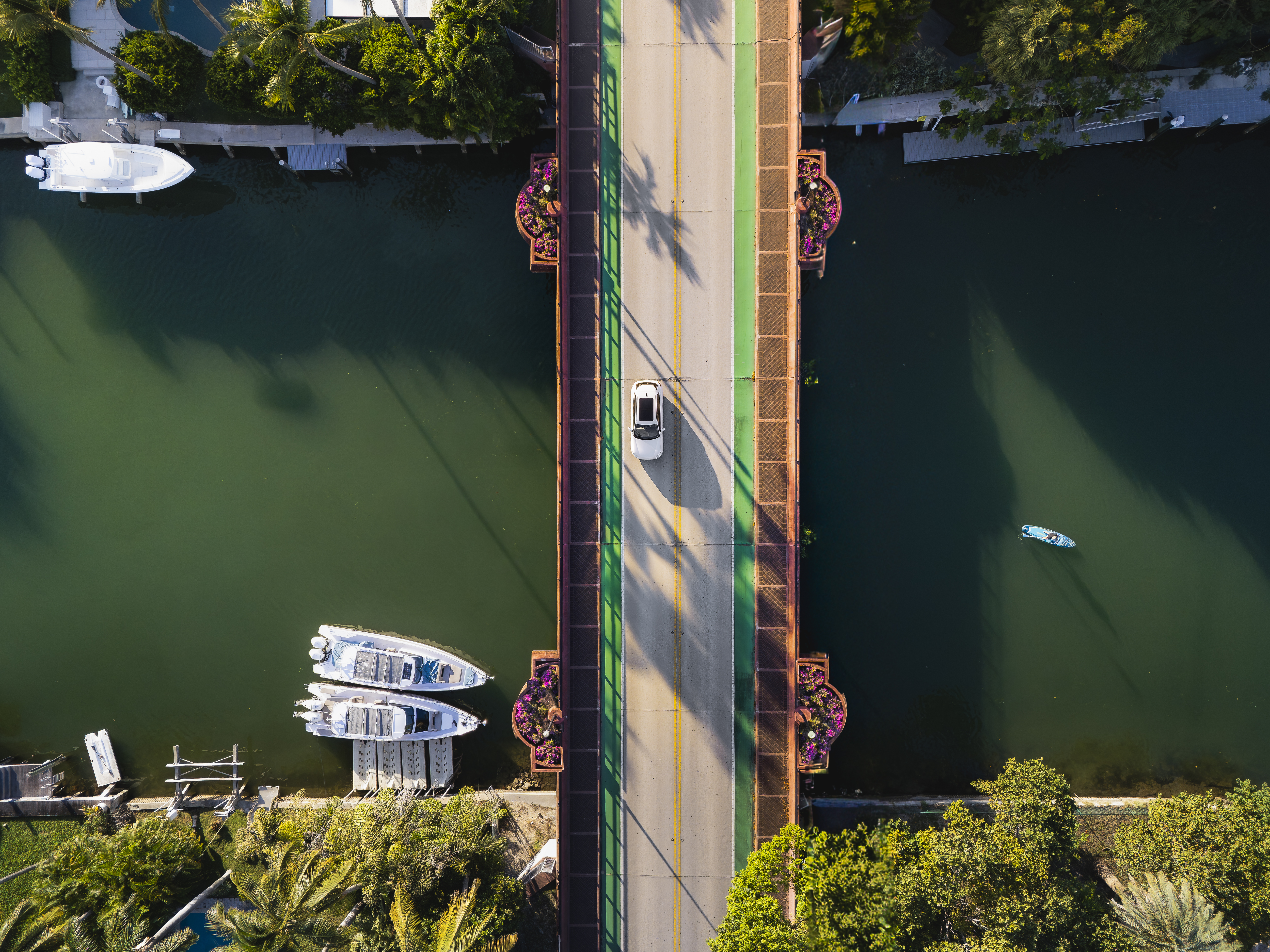 audi house car on a bridge over water from above