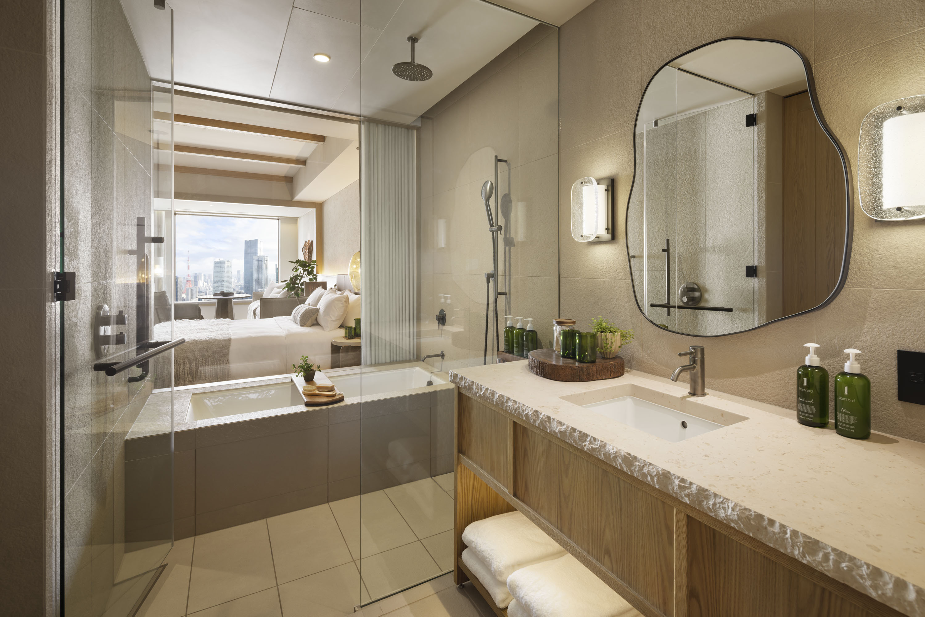 Wood toned modern bathroom with amenities and bathtub