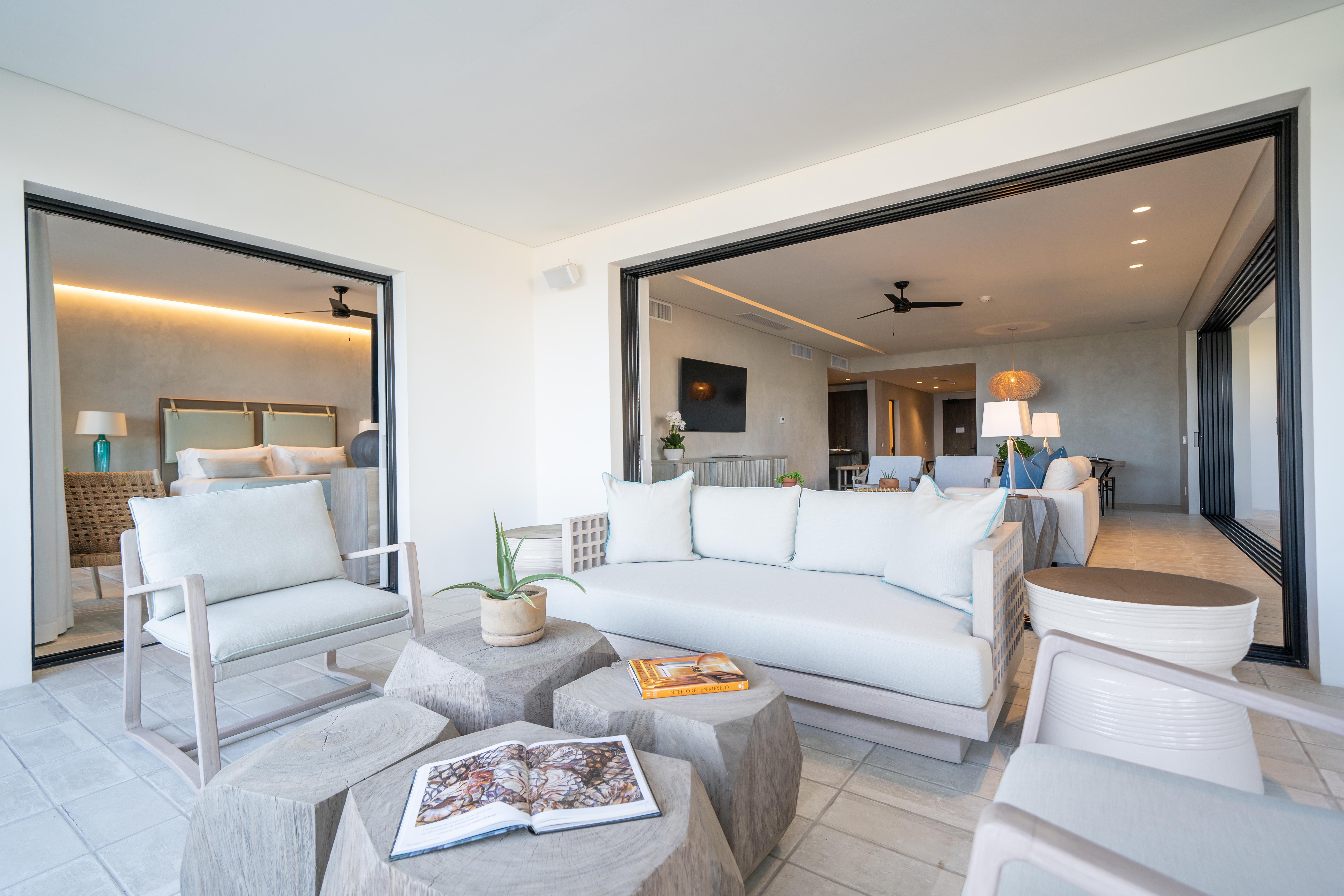 Living room area with a couch and chairs