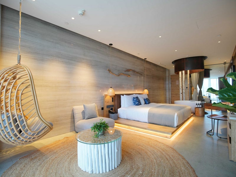 Hotel room with a floating chair