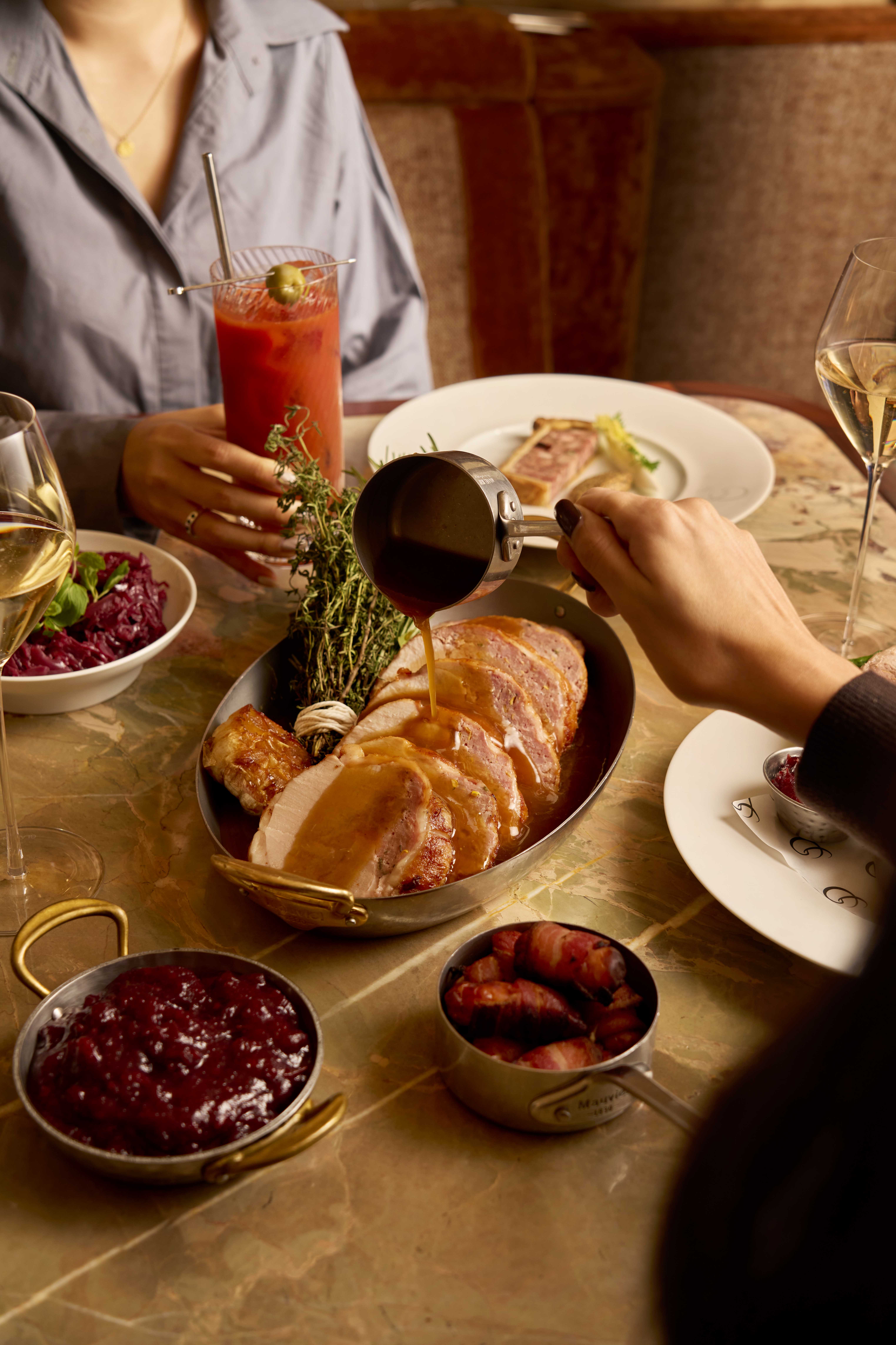 Table with multiple plates and snacks