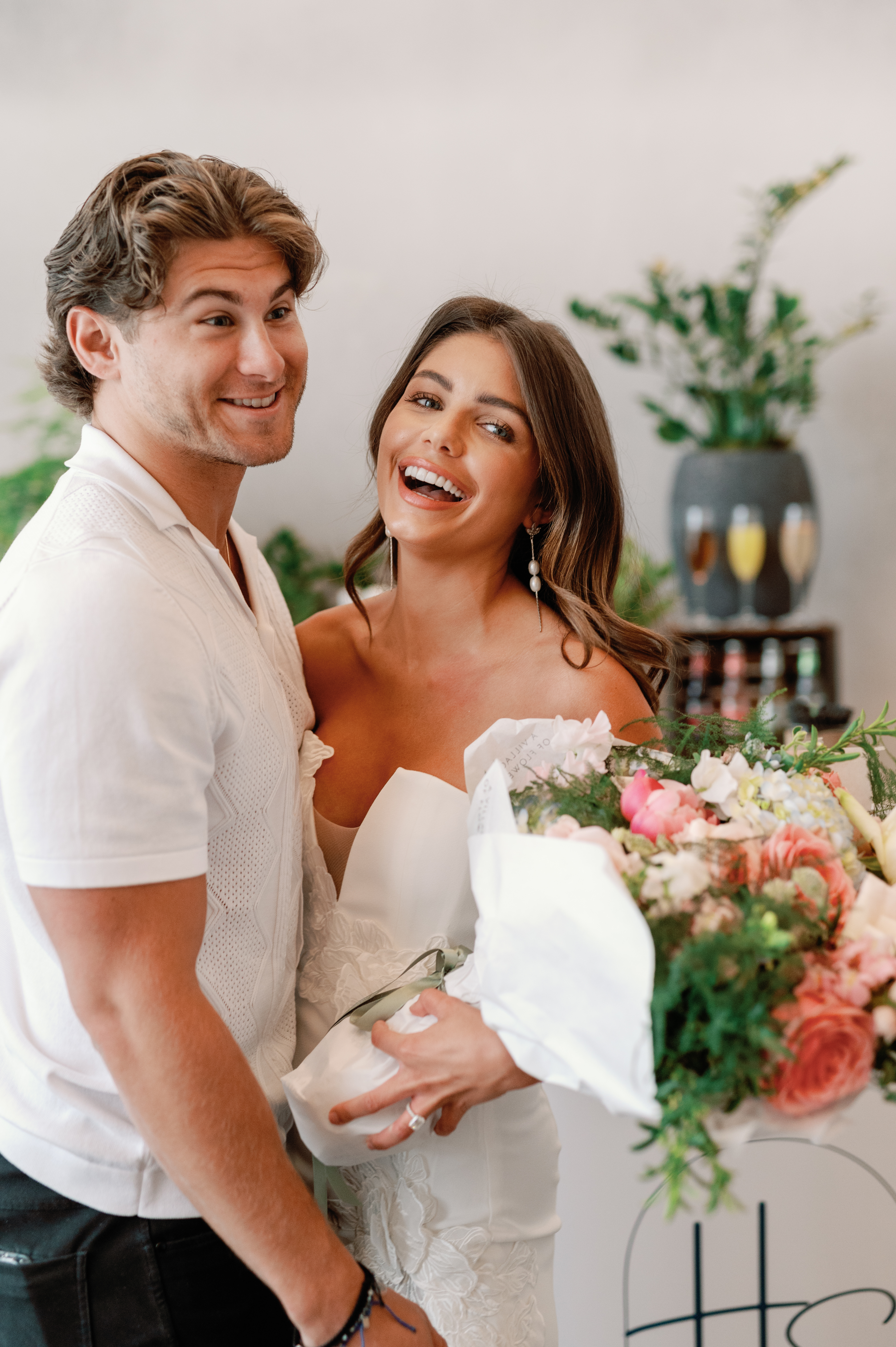couple holding flowers