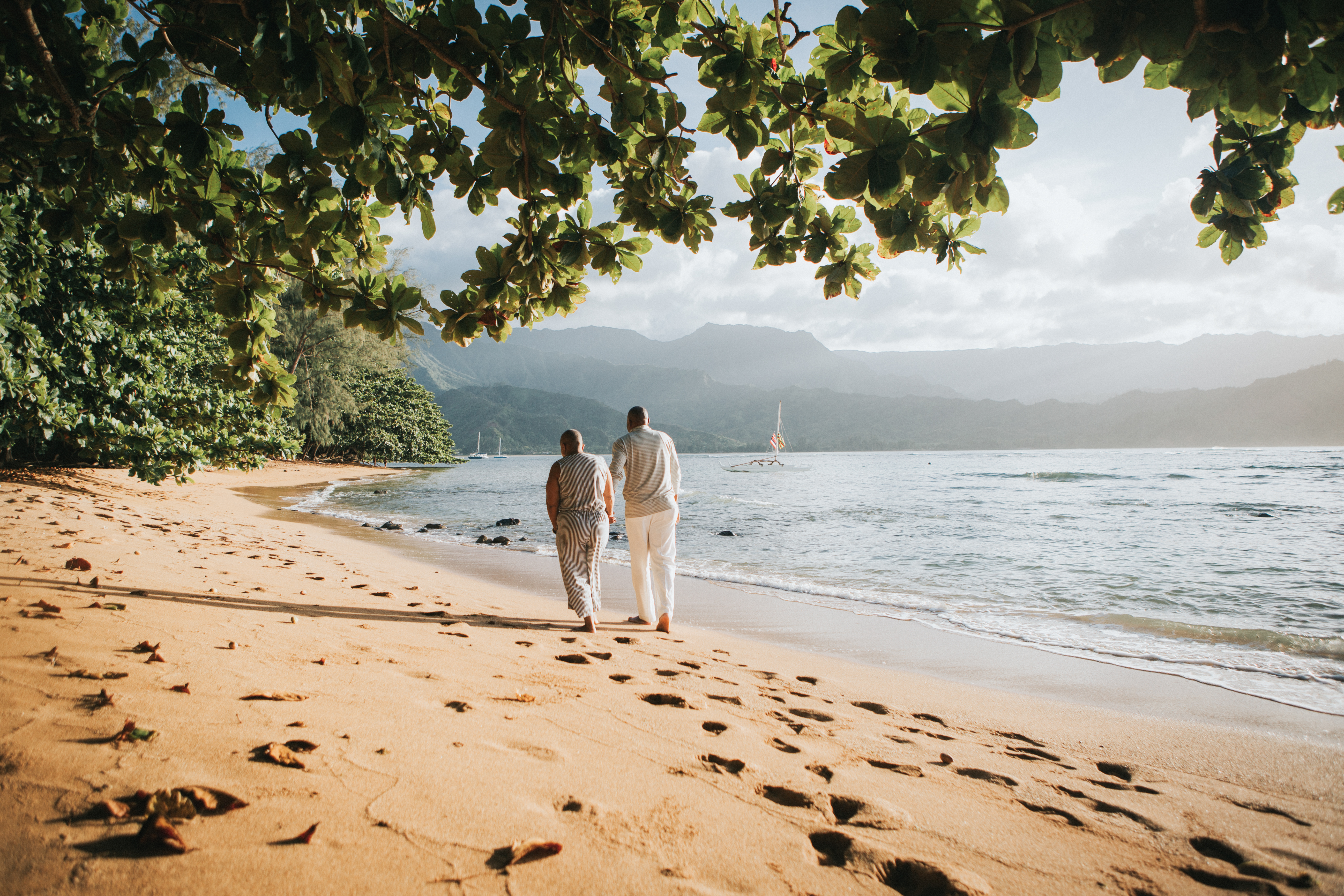 A couple walking on the beach