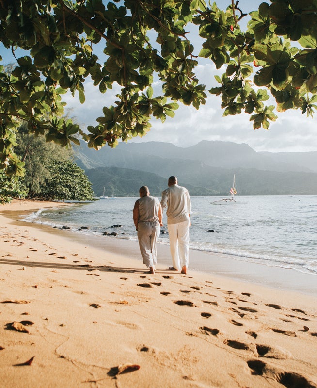 A couple walking on the beach