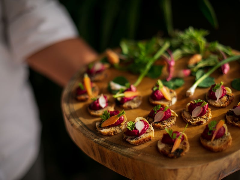 Platter of bite sized beets with crackers