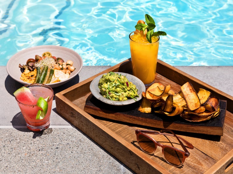 Tray of food by the poolside