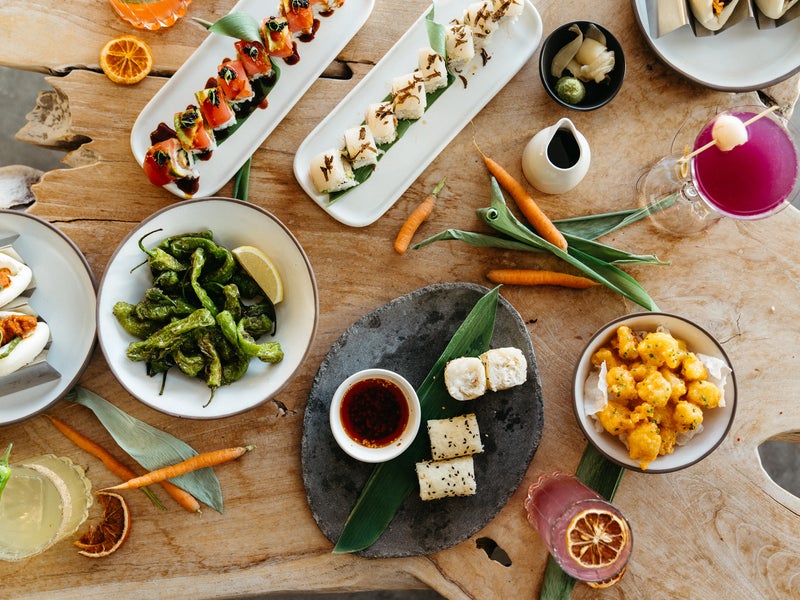 Sushi rolls and side dishes