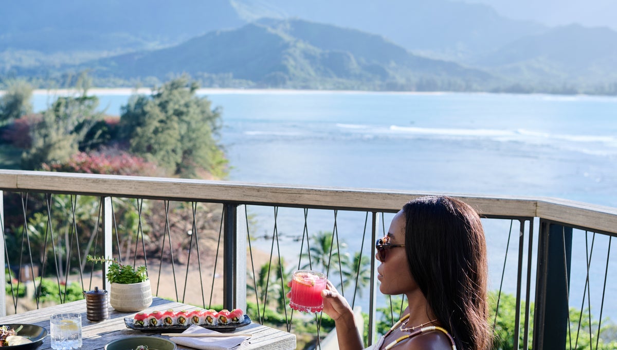 Woman on terrace at 1 Hotel Hanalei Bay