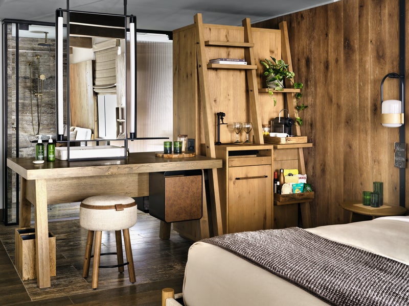Wood themed bedroom with a makeup desk