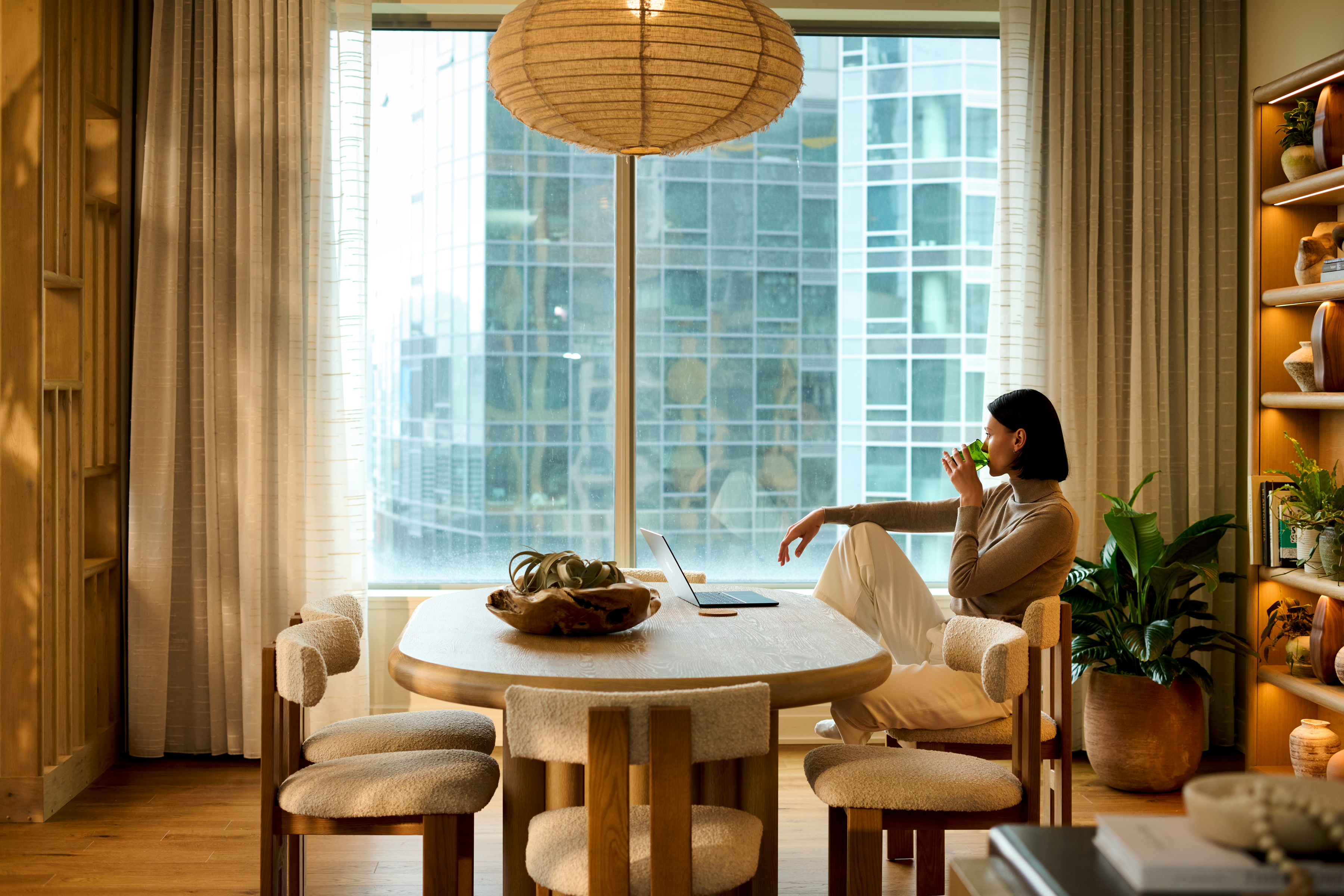 Female looking out of window