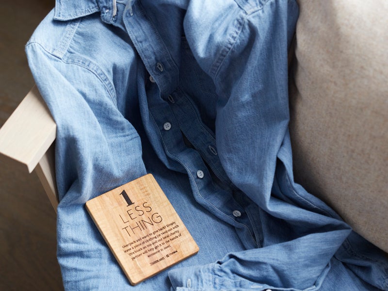 Second-hand shirt with "1 Less Thing" label