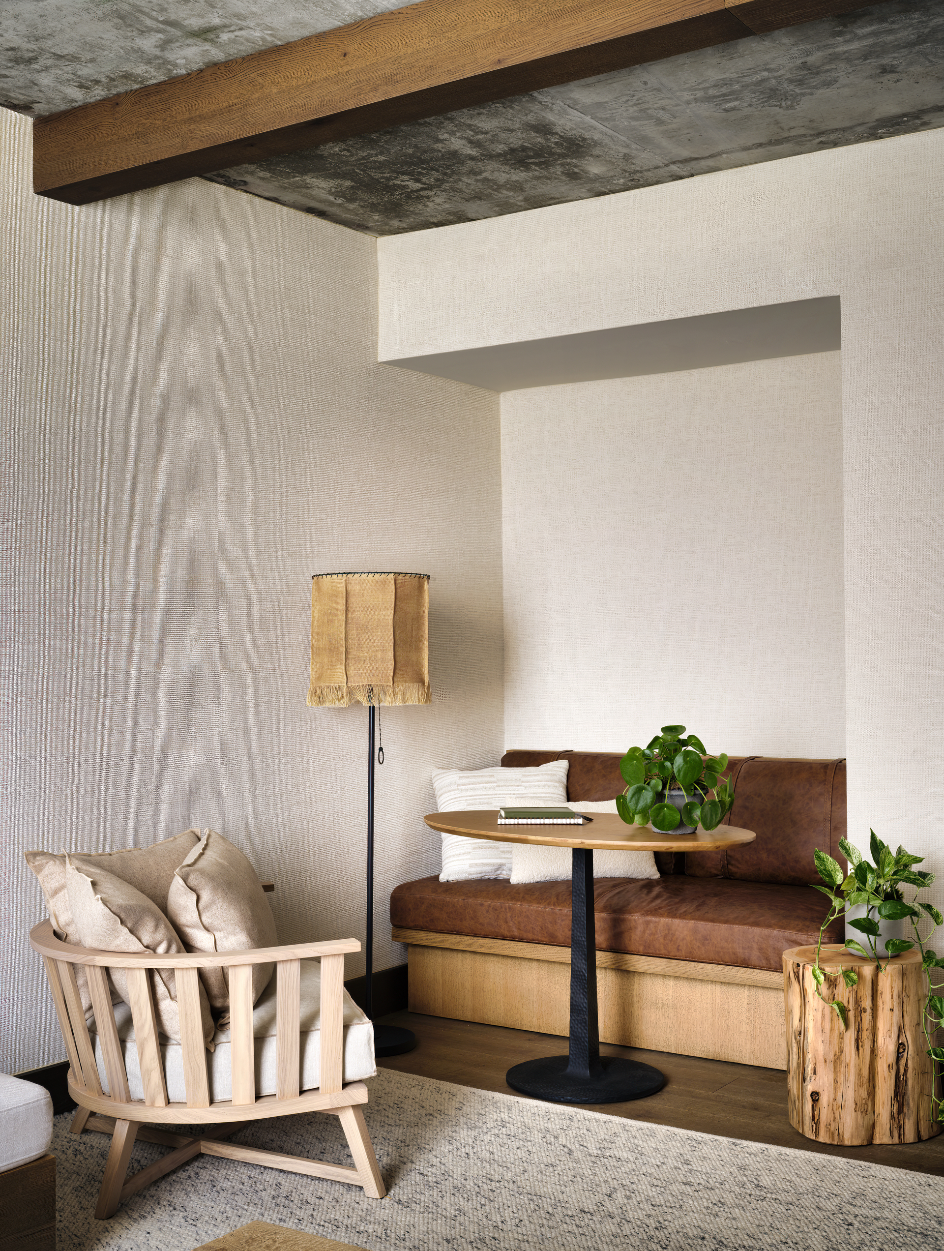 Corner seating nook with table and lamp